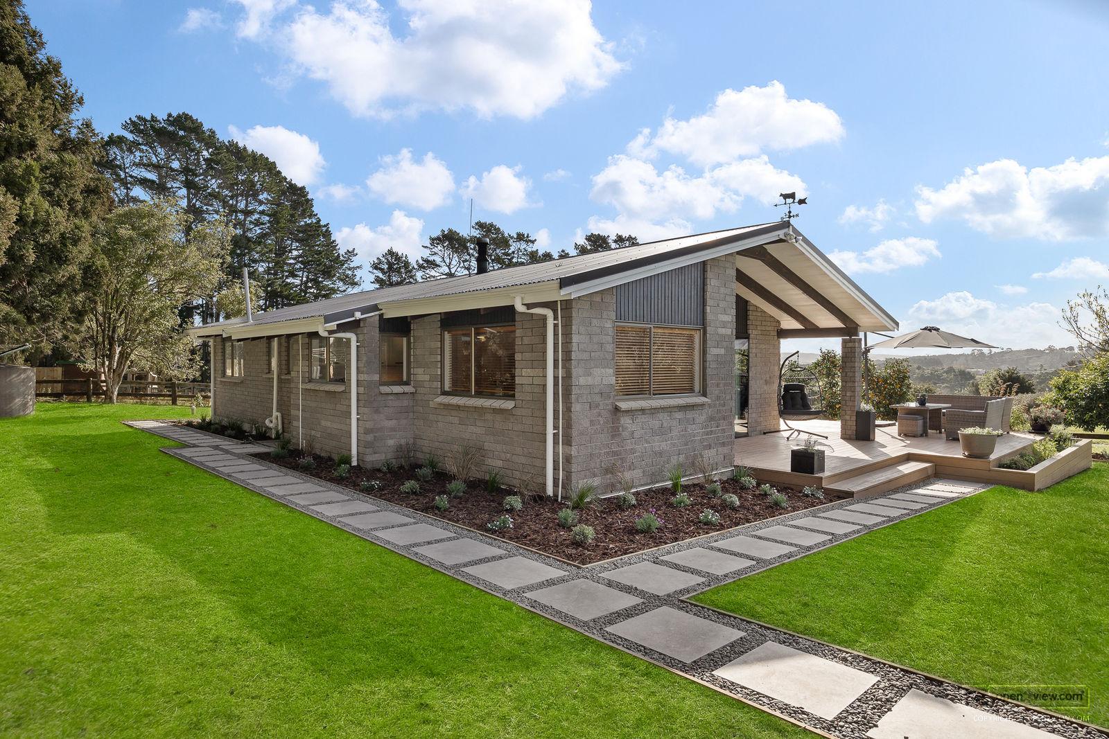 Slider image of 1115 State Highway 16, Auckland