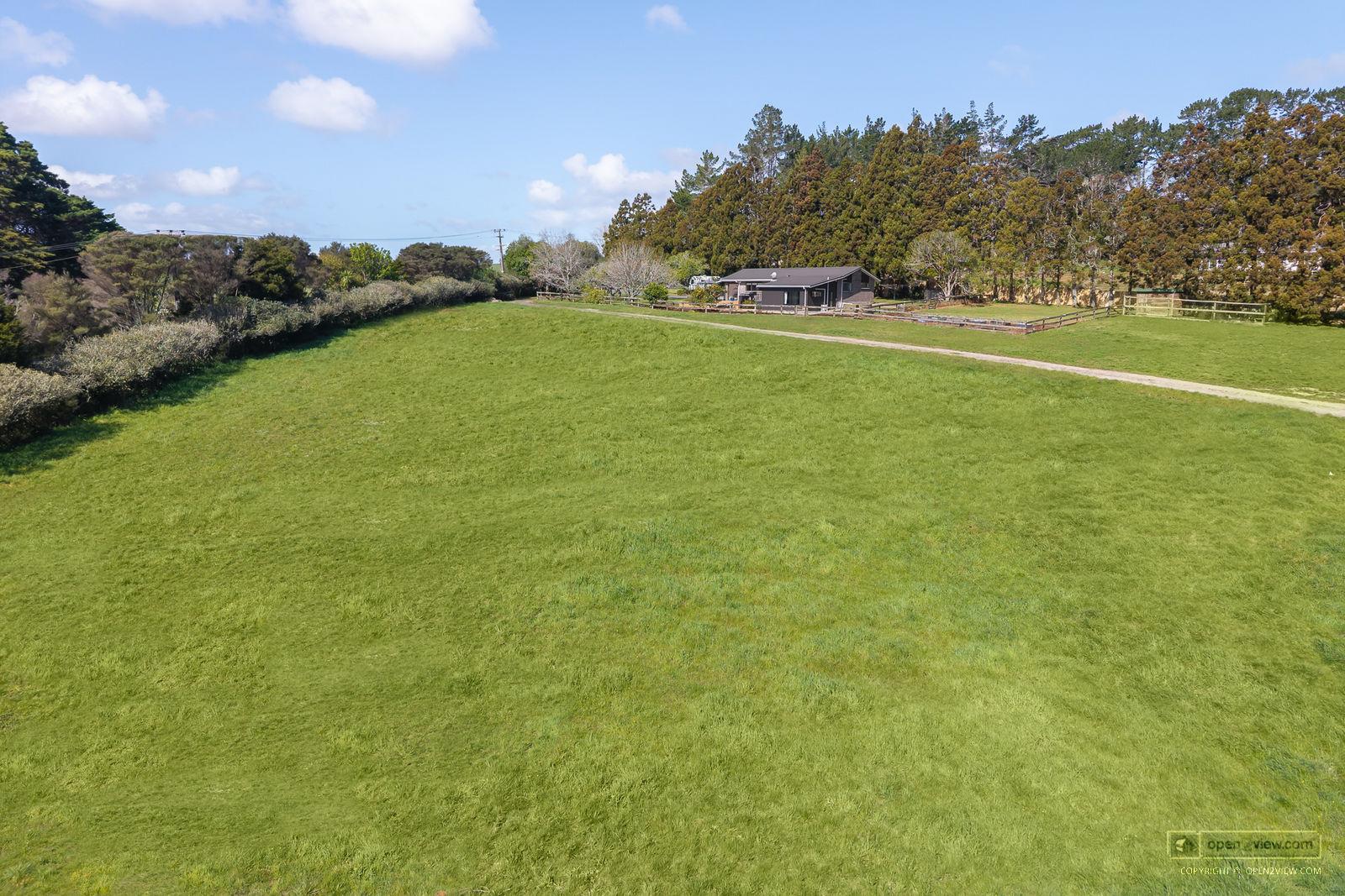 Slider image of 1115 State Highway 16, Auckland