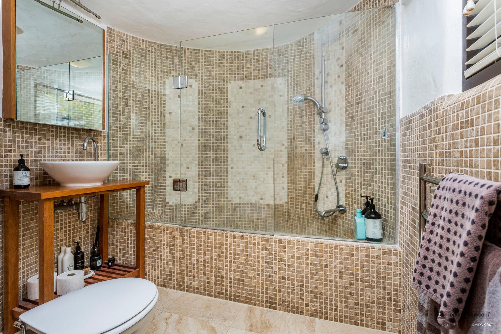 Slider image of 24 Channel View Road, Auckland