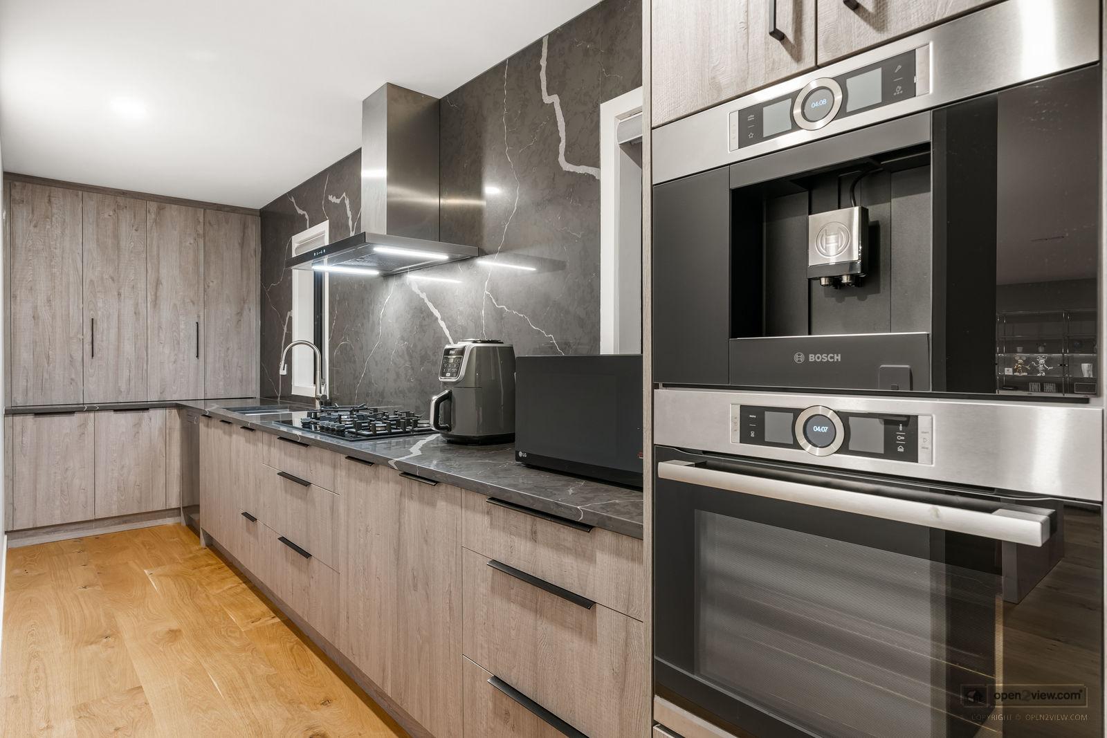 Slider image of 16 Collings Drive, Auckland