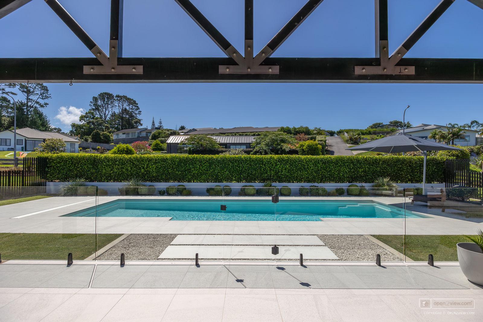 Slider image of 81 Solan Drive, Auckland