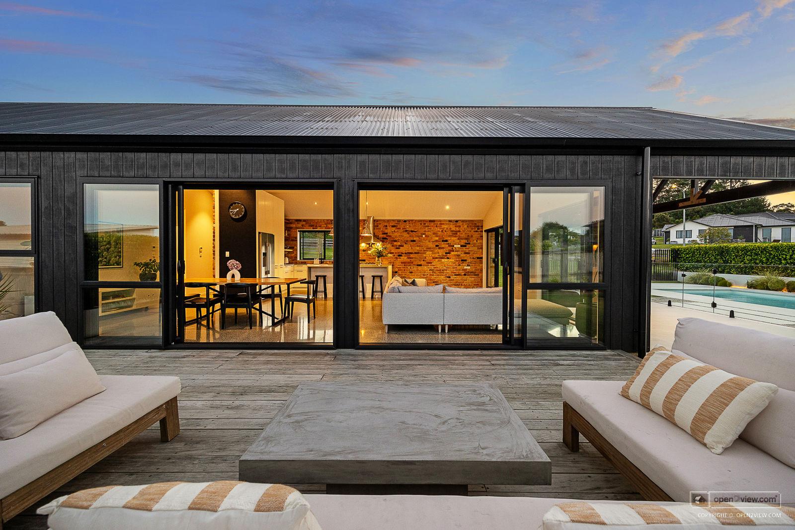 Slider image of 81 Solan Drive, Auckland