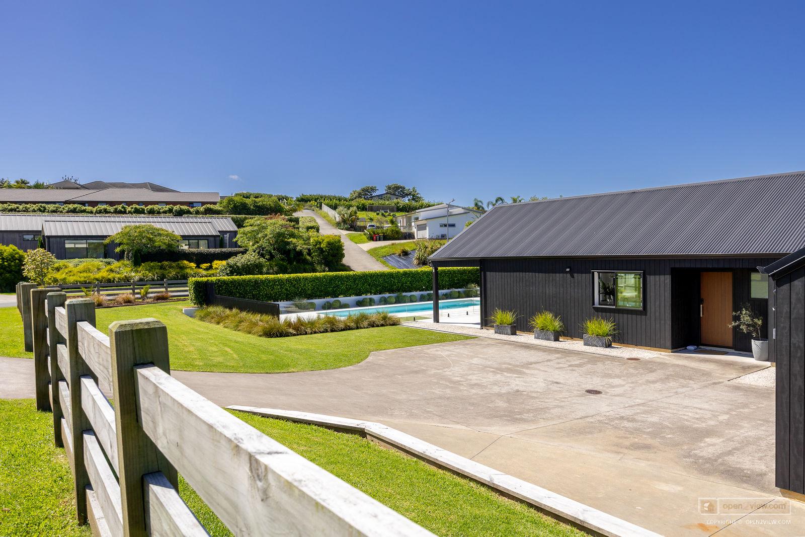 Slider image of 81 Solan Drive, Auckland