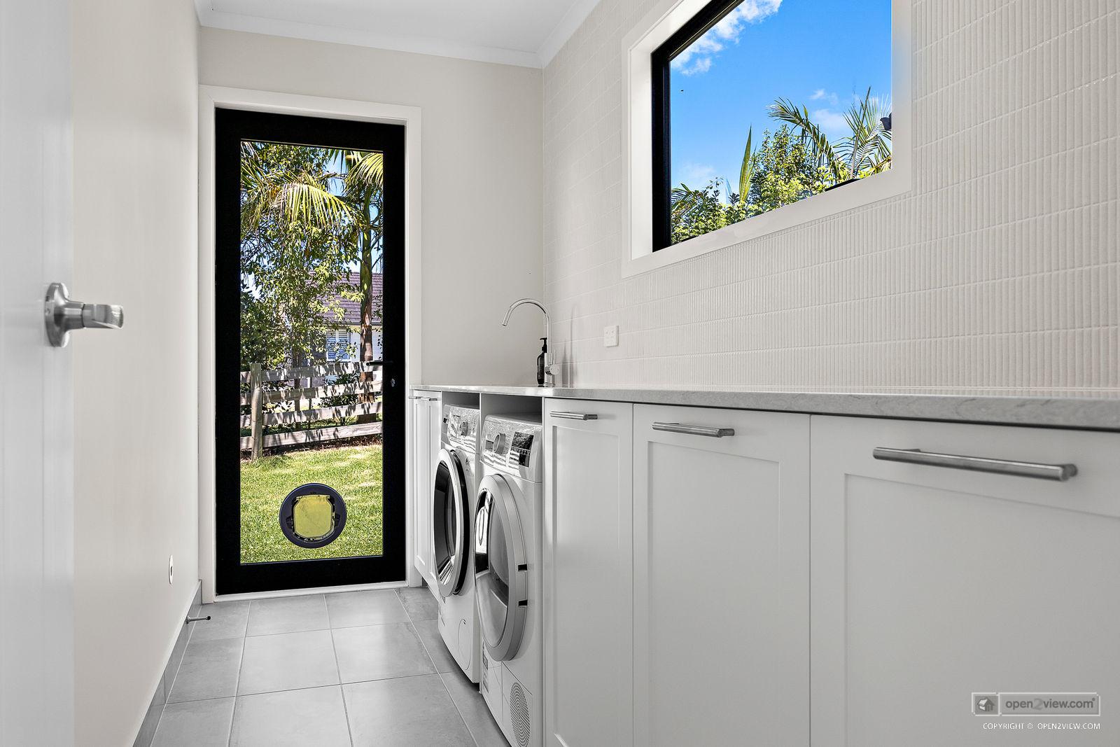 Slider image of 81 Solan Drive, Auckland