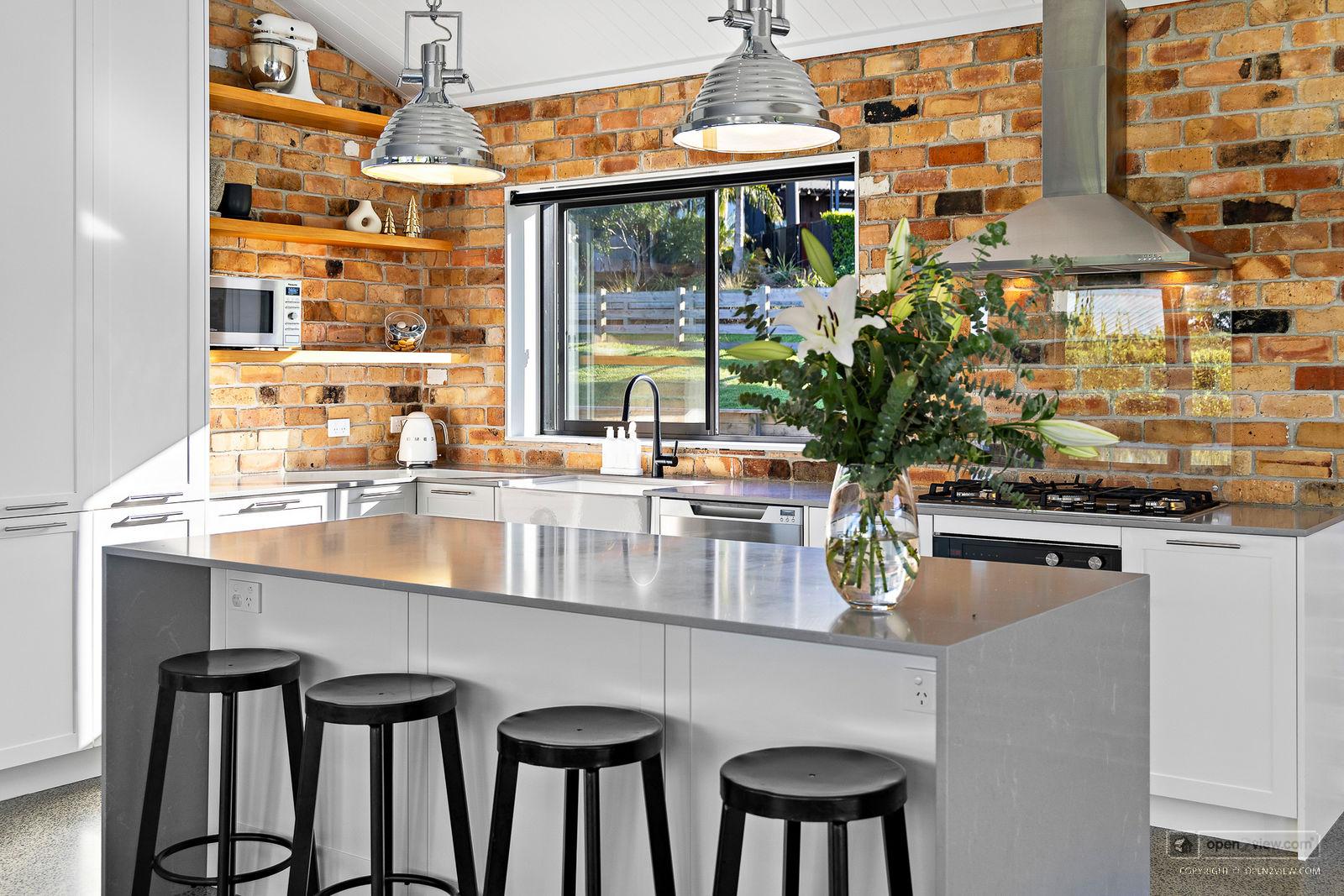 Slider image of 81 Solan Drive, Auckland