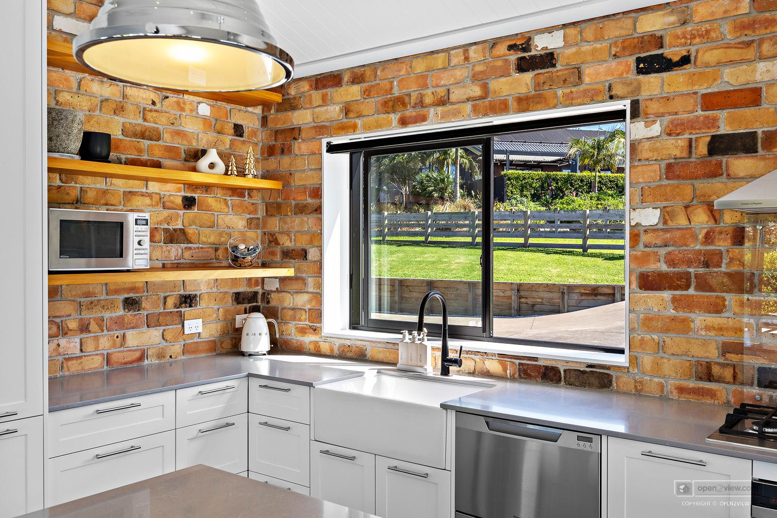 Slider image of 81 Solan Drive, Auckland