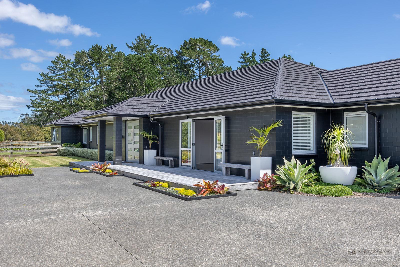 Slider image of 583 State Highway 16, Auckland