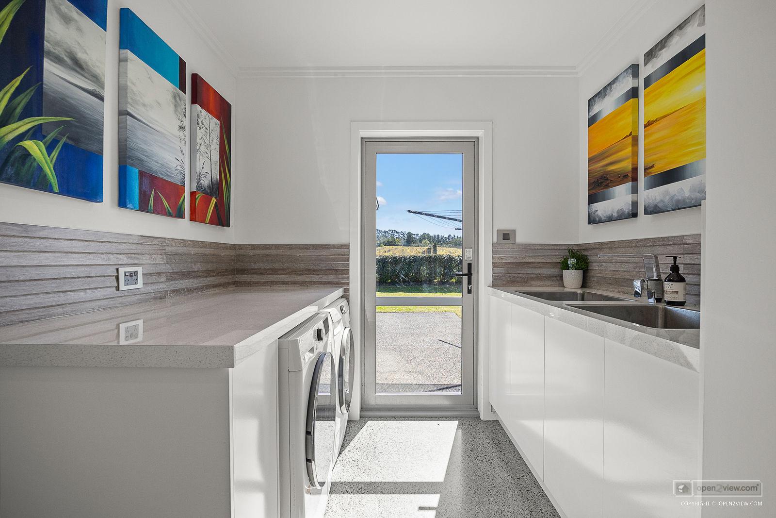 Slider image of 583 State Highway 16, Auckland