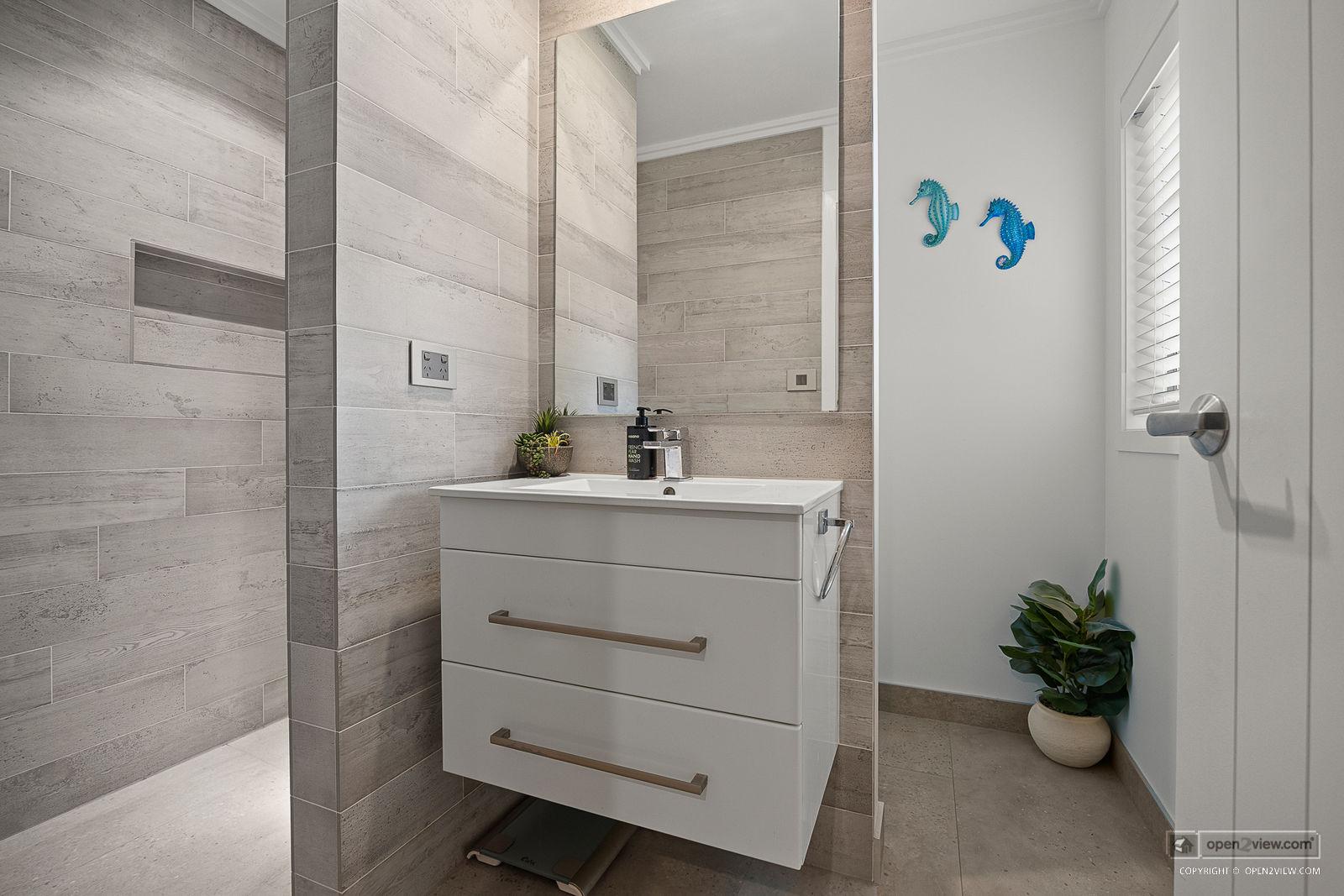 Slider image of 583 State Highway 16, Auckland