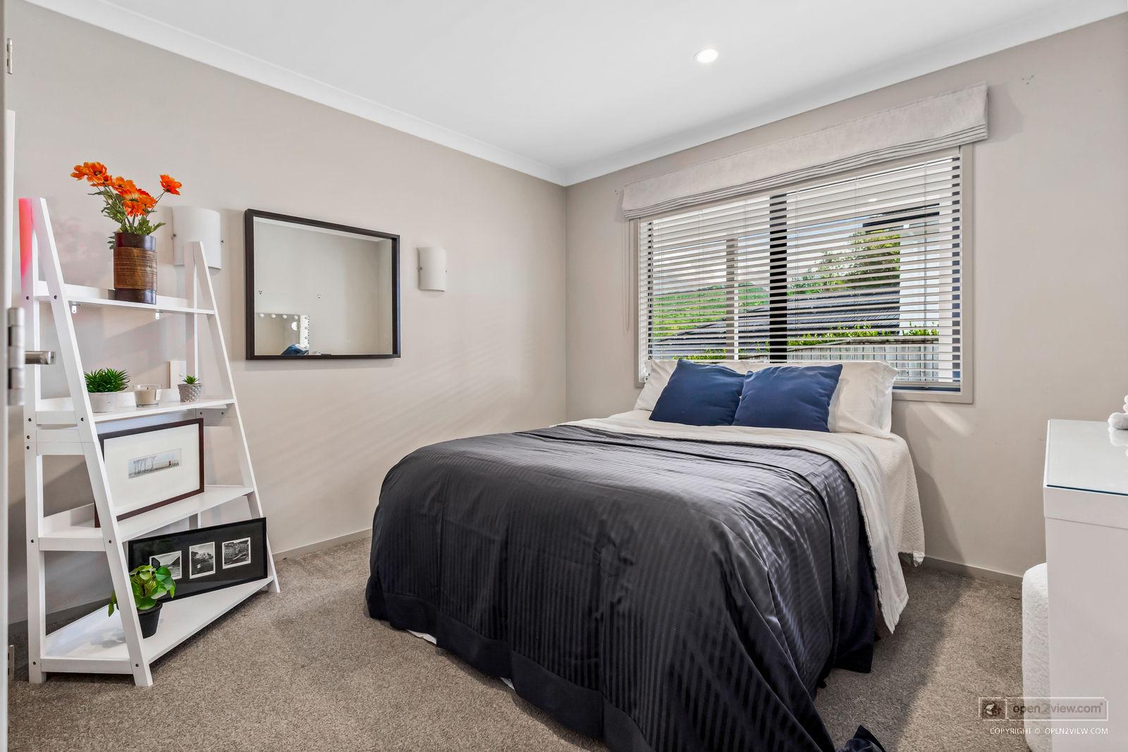 Slider image of 7 Wautaiti Drive, Auckland