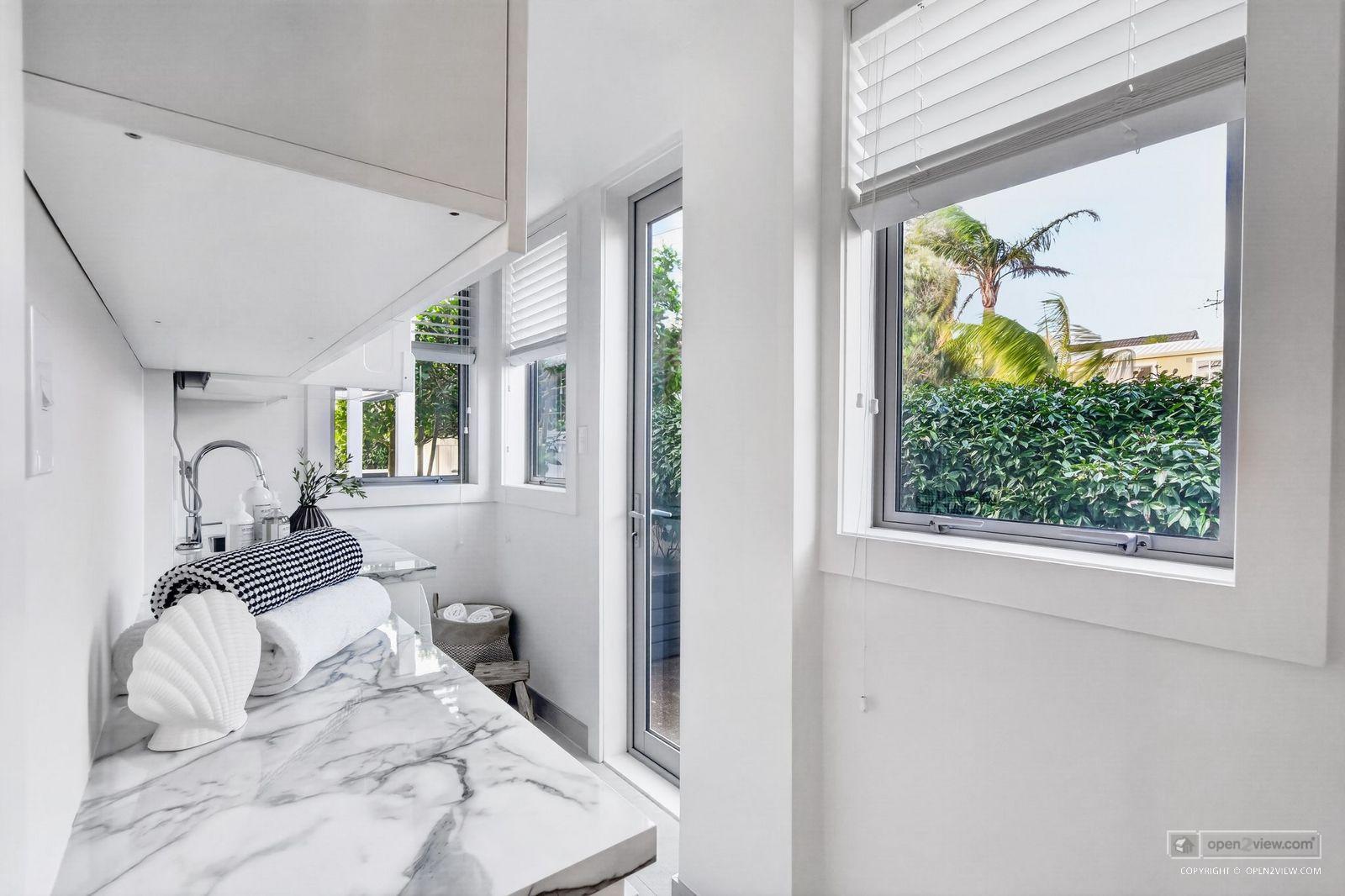 Slider image of 5 Holiday Road, Auckland